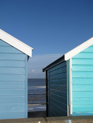 Blues. Huts on north beach. Framed to suit